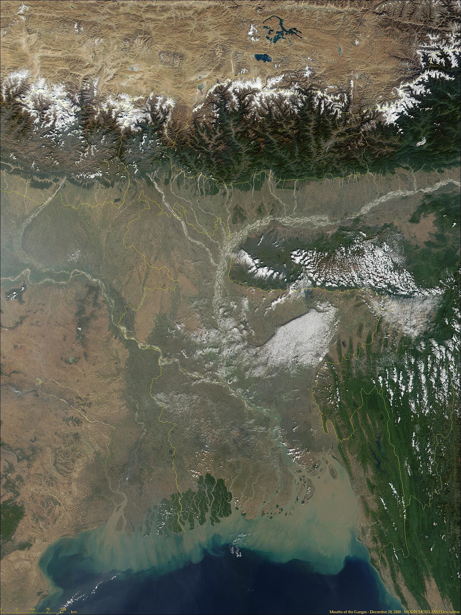 New Moore: la isla que se erosionó y la leyenda de su regreso anual 1 Vista satelital del delta del Ganges y el Brahmaputra, con canales y sedimentos que se abren hacia la bahía de Bengala.